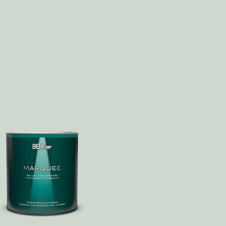 a can of behr marquee green paint