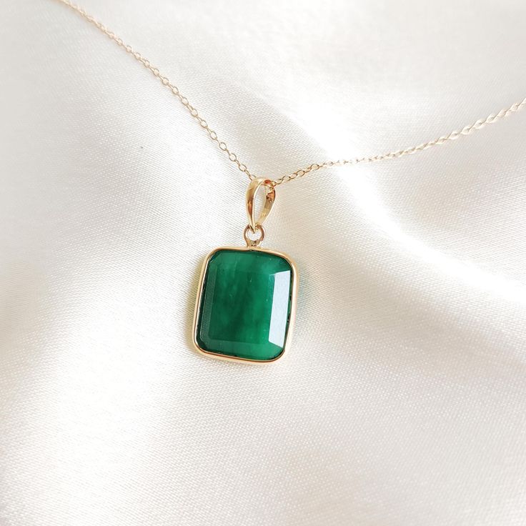 This stunning pendant is set in 14k Solid Yellow Gold with Natural Emerald with utmost precision. It is an unique gemstone Pendant for nearly every occasion and is completely hassle-free jewelry. 🔷ABOUT GEMSTONE:  Emerald is often associated with love and romantic relationships. It is believed to promote love, loyalty, and unity, making it a popular choice for engagement and anniversary jewelry. Emerald is often associated with abundance and financial success. It is believed to attract prosperi Fine Jewelry With Rectangular May Birthstone, Elegant Rectangular Emerald Necklace Gift, Fine Jewelry With May Birthstone In Rectangular Shape, May Birthstone Rectangular Gemstone Necklaces, Elegant Emerald Necklace With Rectangular Pendant For Gift, Elegant Rectangular Emerald Pendant Necklace As Gift, Rectangular Gemstone Necklace For Anniversary, Formal Jewelry With May Birthstone Rectangular Pendant, Classic Necklace With Rectangular Stone As Gift