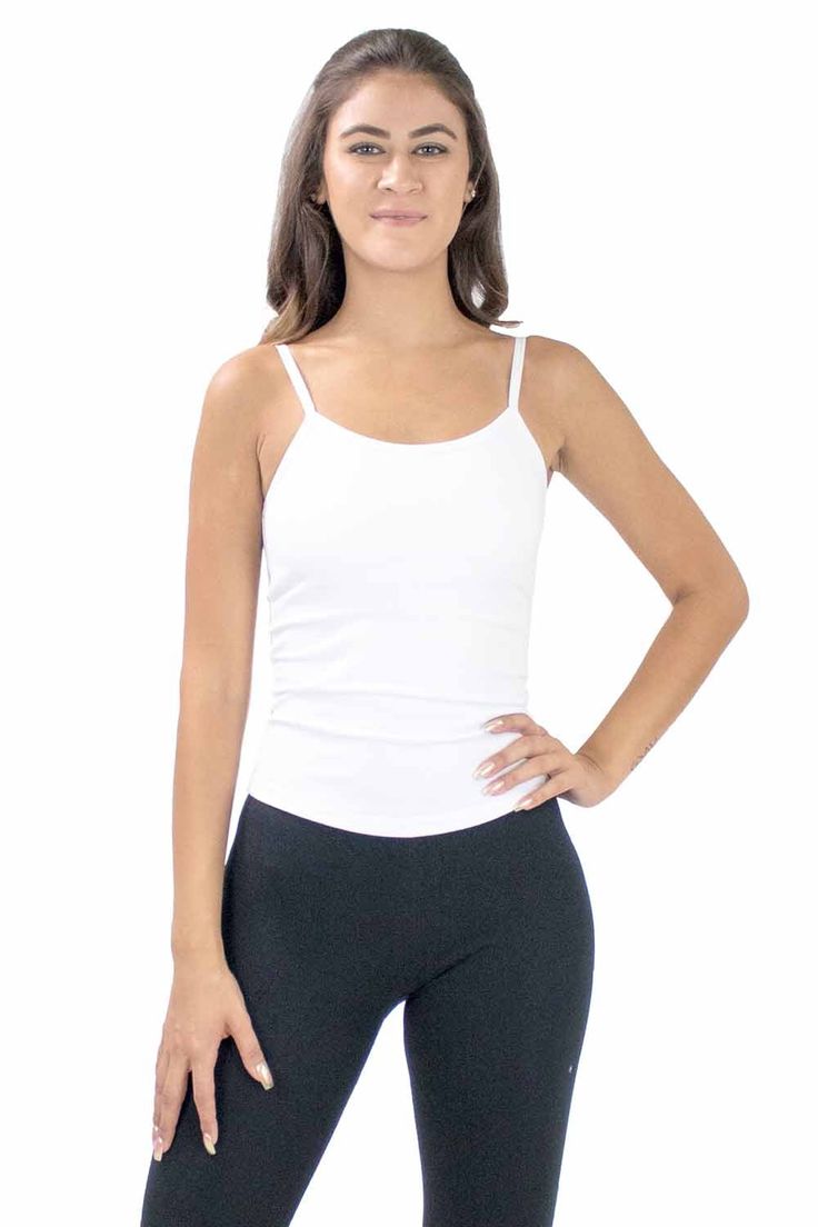 This cotton-blend cami top was designed to be simple and made for comfort and support. The top can be worn alone, layered, or under any outfit. It is always ready for your active lifestyle. Match it with our 2" Inseam Hot Shorts or Metallic Hot Shorts for a fabulous, colorful look. Style: BM4146 Details: Built-in Bra Fabric: Cotton, Polyester, Spandex Sizes: S, M, L, XLColors: Black, White Made in the USAActual color may vary slightly from your monitor. For wholesale inquiries, please call us at Basic Cami Tank Top With Built-in Bra, Yoga Tops With Spaghetti Straps And Built-in Bra, Casual Tank Top With Built-in Bra And Medium Support, Seamless Athleisure Tops For Layering, Solid Color Cami Top With Built-in Bra, Casual Tops With Built-in Bra And Spaghetti Straps, Basic Cotton Tops With Built-in Bra, Cotton Tops With Built-in Bra And Medium Support, Stretch Tops With Built-in Bra For Everyday