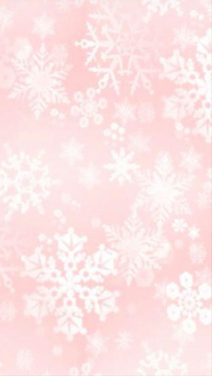 a pink and white background with snow flakes