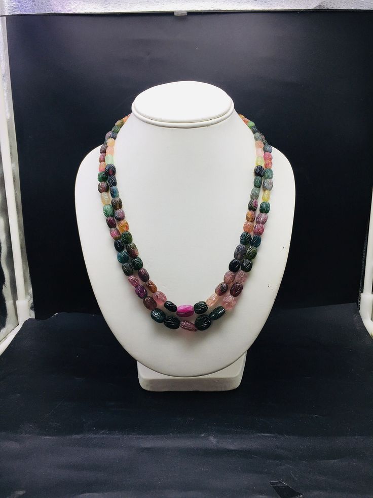 100% Natural multi Tourmaline hand-carved nugget shape beaded necklace with adjustable silk cord closure. Details: - Gemstone - Multi Tourmaline Shape - Oval nugget Strand - 2 Calibration of beads - 6x8 millimeters till 10x14 millimeters Gross weight - 395.60 carat Net weight - 373.10 carat Length - 18 Inches ( Inner ) and 19 Inches ( Outer ) SKU - HJSPSAR0089 100% NATURAL MULTI-COLORS OF TOURMALINE READY TO WEAR NECKLACE ADJUSTABLE SILK CORD CLOSURE VERY NICE LOOKING NECKLACE UNIQUE NECKLACE AT Multicolor Single Strand Gemstones As A Gift, Multicolor Single Strand Jewelry For Healing, Multicolor Multi-stone Oval Necklaces, Oval Multicolor Multi-stone Necklaces, Multicolor Multi-stone Oval Necklace, Multicolor Oval Multi-stone Necklace, Artisan Multicolor Crystal Gemstone Necklace, Spiritual Multicolor Faceted Necklace, Multicolor Tumbled Jewelry For Healing