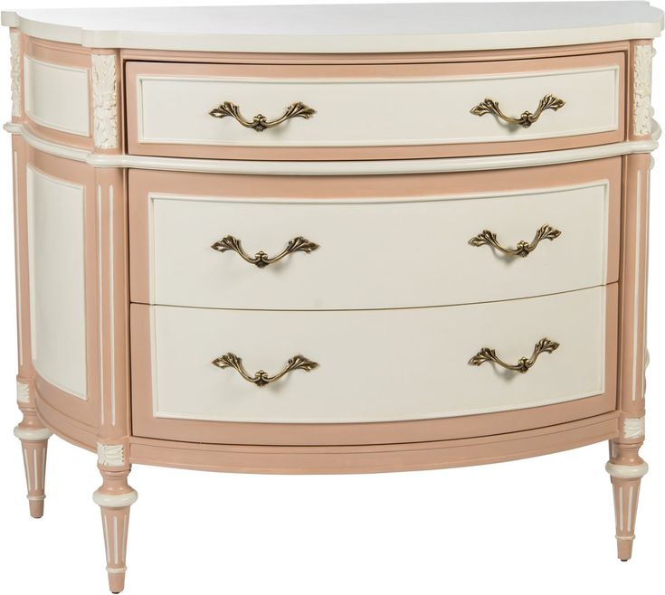 a white and pink dresser with gold handles