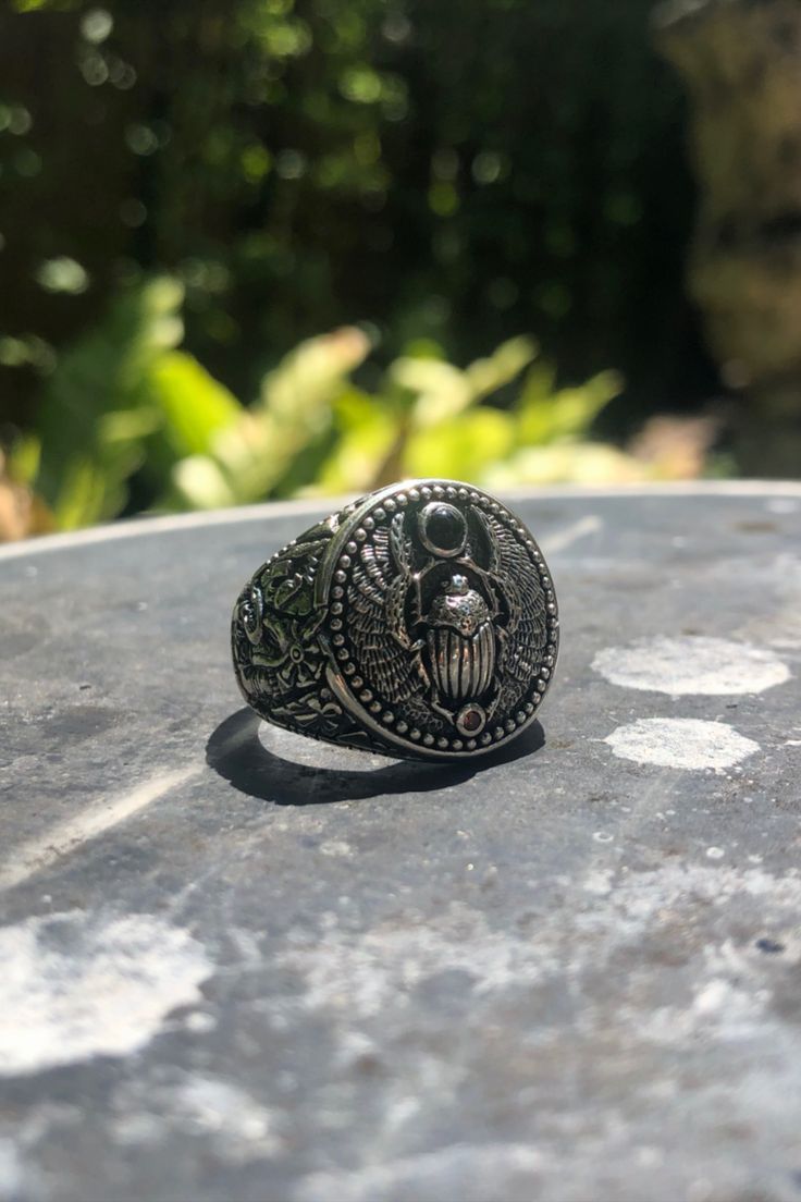 Handcrafted scarab w/ onyx stone sterling silver ring. Guaranteed 925 sterling silver with finest standards. Best fit for both women and men from ring size 6-13 US. We are now running a 10-20% sale on our… More Adjustable Silver Signet Ring With Gemstone, Silver Symbolic Gemstone Rings, Oxidized Sterling Silver Signet Ring, Symbolic Silver Gemstone Rings, Symbolic Black Rings With Oxidized Finish, Symbolic Silver Rings With Gemstone, Sterling Silver Signet Ring With Oxidized Finish, Antique Sterling Silver Adjustable Signet Ring, Symbolic Nickel-free Engraved Ring