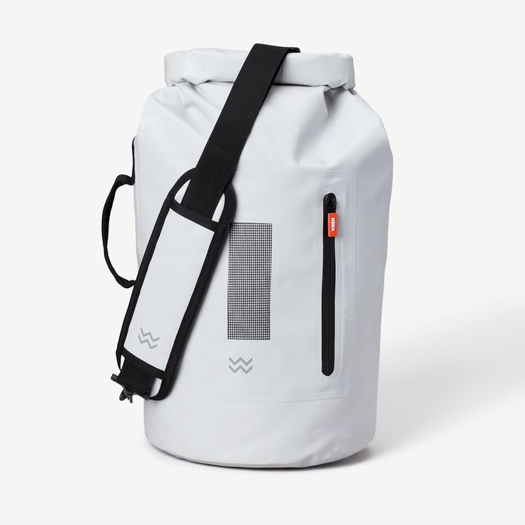 a white bag with black straps and an orange tag hanging from the front, on a white background