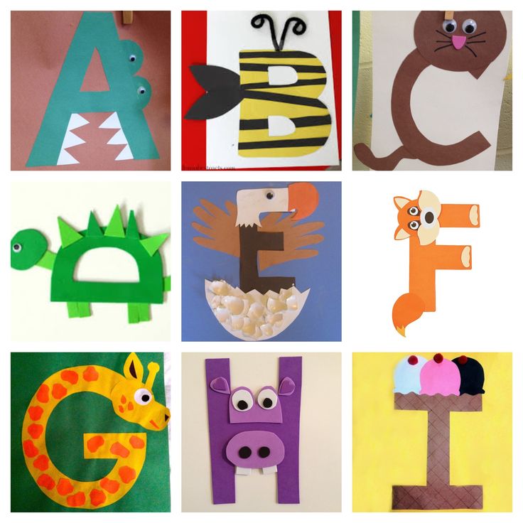 the letters are made out of paper and have animals on them