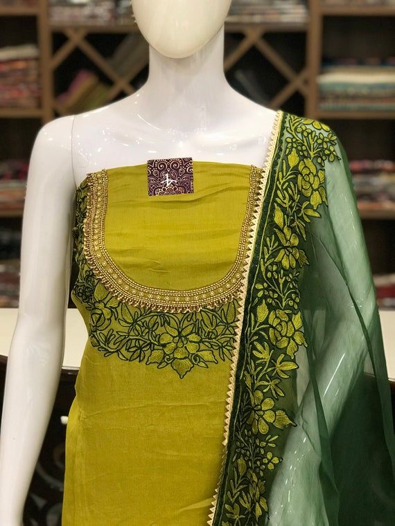 A stunningly fabulous outfit featuring Kashmiri Aari fused hand Zardozi embroidery. - - - - - - - - - - - - - - - - - - - -  Product Details - Condition: Brand New - Style: Indian Ethnic Dress - Colour: Green - Embroidery Colour: Light & Dark Green - Care Instructions: Dry Clean Only F A B R I C Embroidered Slub Silk Sharara For Navratri, Green Slub Silk Traditional Wear With Resham Embroidery, Traditional Slub Silk Churidar With Dabka Work, Designer Embroidered Slub Silk Kurta, Green Cotton Silk Traditional Wear With Resham Embroidery, Designer Green Slub Silk Dupatta, Festive Slub Silk Churidar With Resham Embroidery, Designer Sharara With Resham Embroidery In Slub Silk, Festival Slub Silk Sharara With Dabka Work