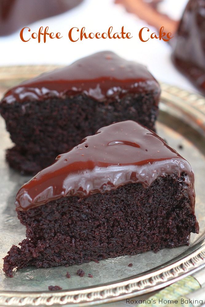 two pieces of chocolate cake on a silver plate