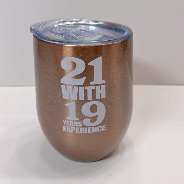 a metal cup with the words 21 with 19 years end experience printed on it