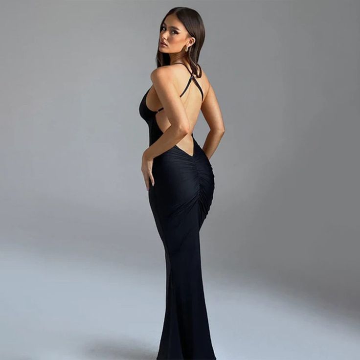 F00267787-102 Evening V-neck Backless Dress With Fitted Bodice, Elegant Ruched V-neck Backless Dress, Elegant V-neck Backless Party Dress, Glamorous Sheath Midi Dress For Night Out, Elegant Maxi Length Backless Dress For Party, Fitted V-neck Evening Dress With Ruched Back, Flirty Sleeveless Evening Dress, Evening Dress With V-neck And Back Opening, Evening Sleeveless Bodycon Dress For Prom