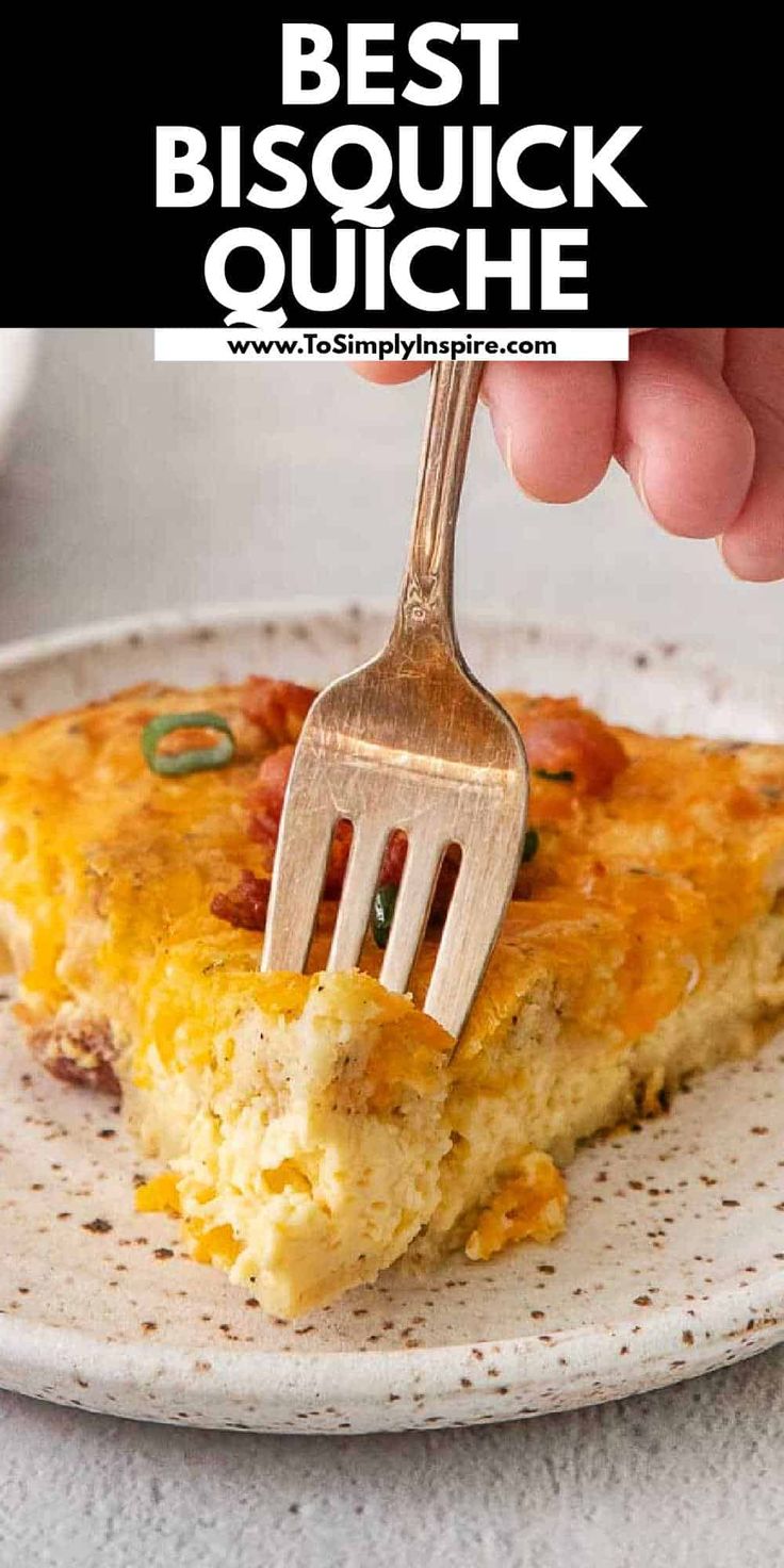 a person holding a fork over a piece of quiche