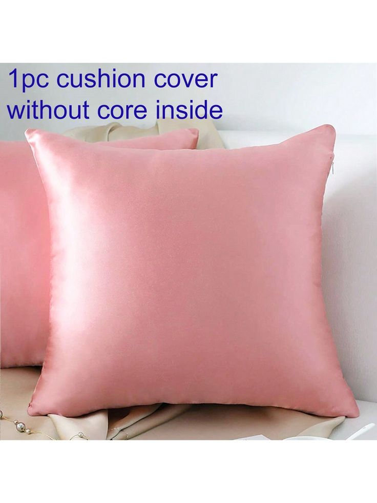 two pink pillows sitting next to each other on a white couch with the text, 1 pc cushion cover without core inside