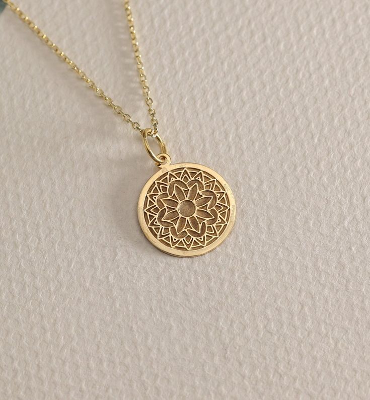 14K Real Solid Gold Mandala gold necklace ● Material of pendant: Solid Gold 14k ( REAL GOLD ) ● Metal Stamp: 14L ( REAL GOLD ) ● The pendant is available in 6 sizes: - 14,0 mm / 0,55 inches ( Diameter ) In the photos - 15,3 mm / 0.60 inches ( Diameter ) - 16,5 mm / 0,65 inches ( Diameter ) - 19,1 mm / 0,75 inches ( Diameter ) - 21 mm / 0,82 inches ( Diameter ) - 23 mm / 0.90 inches ( Diameter ) ( In the photos the size is 14mm / 0.55 inches Diameter ) ( Jump Ring inner diameter: 4 mm ) ● Materia Cheap Spiritual Yellow Gold Jewelry, 14k Gold Medallion Amulet Jewelry, Gold-plated Yellow Gold Charm Necklace With Round Pendant, Gold Plated Yellow Gold Charm Necklace With Round Pendant, Yellow Gold Plated Charm Necklace With Round Pendant, Gold Round Gold-plated Charm Necklaces, Gold Plated Round Charm Necklaces, Gold-tone 14k Gold Filled Necklaces, Gold-tone 14k Gold Filled Necklace