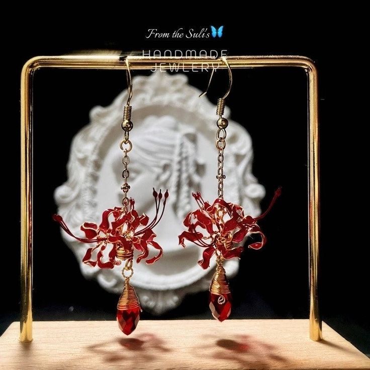 Red Spider Lily Earrings, Flower Dangle Drop Earrings, Floral Dangle Earrings, Lycoris Radiata Earrings, Long Earrings, Flower Earrings. Allow me to present to you SulisShopVN's delightful handmade jewelry, crafted with love by Suli herself, just for you! 💖 Each piece is uniquely handcrafted, so you might notice tiny, charming imperfections - but worry not, as Suli works diligently to make everything as perfect as possible before sending it your way. 🌟 If you have any questions or need advice about our products, please don't hesitate to get in touch with us. We're more than happy to help! 😊 Thank you for choosing SulisShopVN to accompany you on your journey of self-expression and adornment. We truly appreciate it! ❤️ With love and gratitude, ❤️ SulisShopVN Red Spider Lily Jewelry, Red Teardrop Chandelier Earrings As Gift, Red Crystal Drop Earrings For Gifts, Red Chandelier Earrings As Gift, Elegant Flower Teardrop Earrings For Gift, Elegant Flower Shaped Teardrop Earrings, Red Flower Earrings With Ear Wire, Red Drop Earrings For Bridal Gift, Red Drop Bridal Earrings As Gift