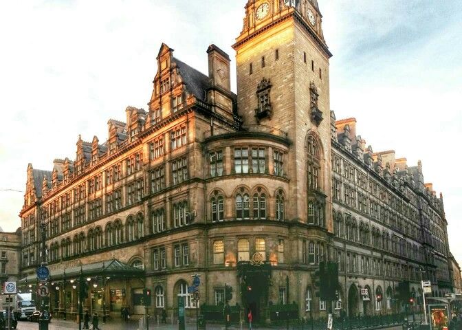 an old building with a clock tower on top