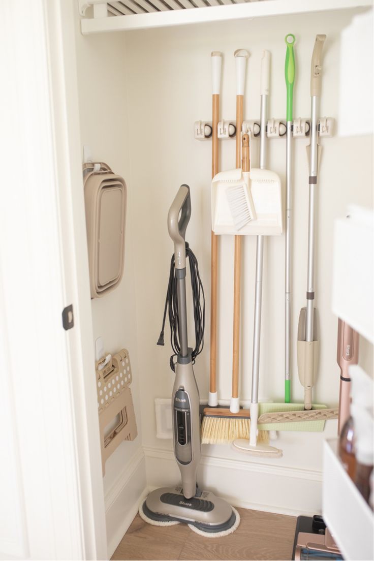 a room that has some cleaning supplies on the floor