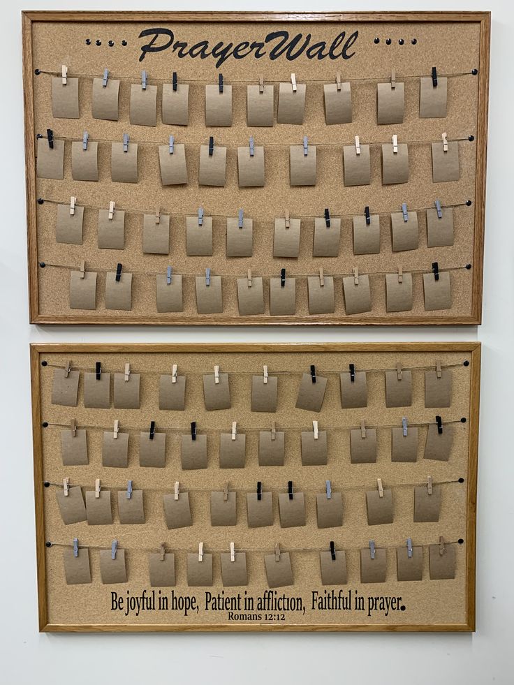 two bulletin boards with clothes pins and pegs attached to them, hanging on the wall