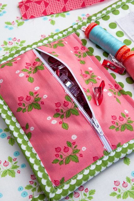 sewing supplies are laid out on a table