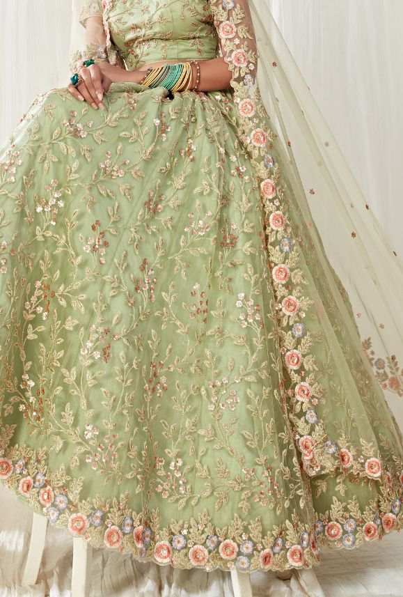 Latest Designer Bridal Wedding Wear Lehenga Choli. LEHENGA FABRIC: Net with Banglori Silk BLOUSE FABRIC: Net with Banglori Silk DUPATTA: Net COLOR: Pista Green WORK: Embroidery Bonus offer - Receive a free mystery gift with your order. Stitching Option - We will email you the measurement guide to confirm your size. SHIPPING: The product will be shipped within 1 - 2 weeks from the date of purchase. Product is returnable if un-Stitched This product qualifies for free shipping For any Rush/Urgent o Pista Green Lehenga, Indian Prom Dresses, Simple Lehenga Choli, Culture Clothes, Green Lehenga Choli, Simple Lehenga, Groom Wedding Attire, Pista Green, Lehenga Fabric