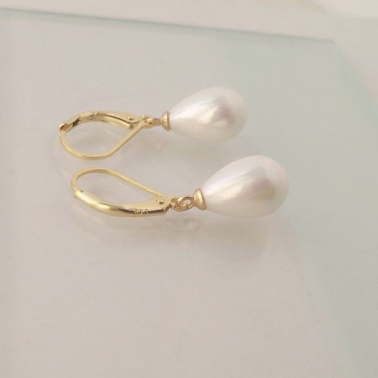 Teardrop Pearl Earrings Ivory White Pearl Earring for Women | Etsy Mexico White Pear-shaped Party Jewelry, Graceful Yellow Gold Wedding Earrings, Elegant Pear-shaped Pearl Earrings For Anniversary, Classic White Pear-shaped Bridal Earrings, White Pear-shaped Bridal Earrings For Party, Elegant Yellow Gold Pearl Earrings For Wedding, Pear-shaped White Bridal Earrings For Party, Elegant Yellow Gold Teardrop Earrings For Wedding, Elegant White Pear-shaped Jewelry