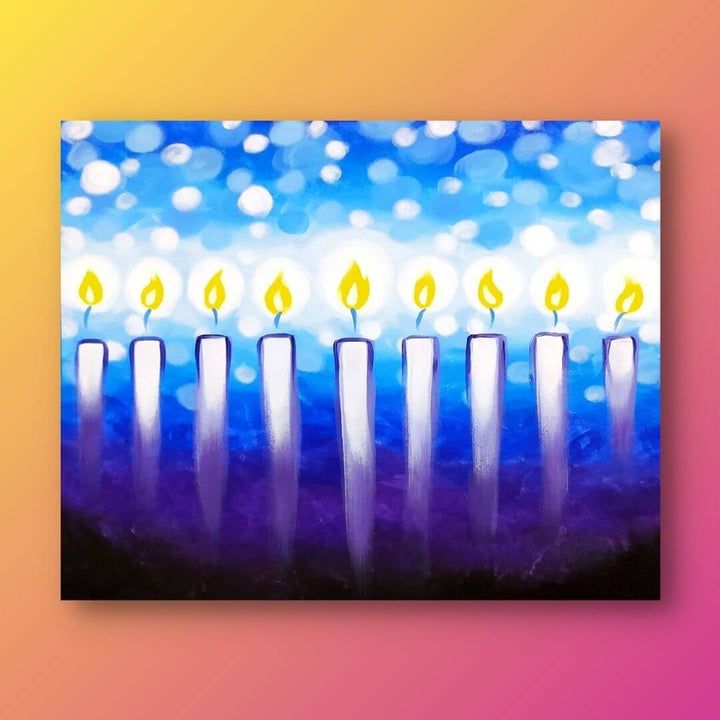 a group of lit candles sitting on top of a purple and blue background with bubbles