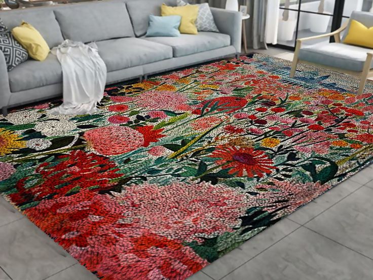 a living room filled with furniture and colorful rugs