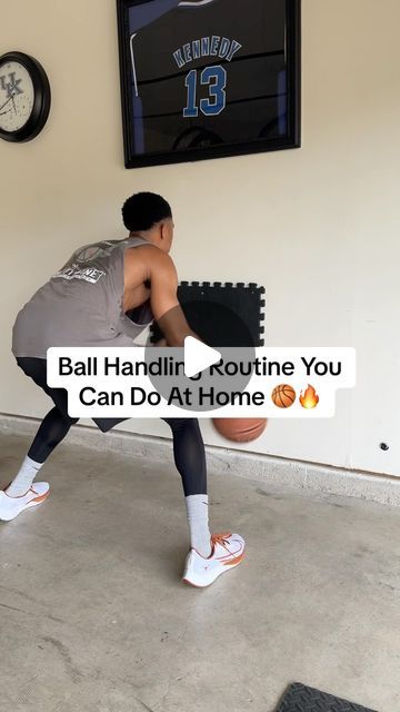 a man holding a basketball while standing in front of a wall with the words ball handling routine you can do at home