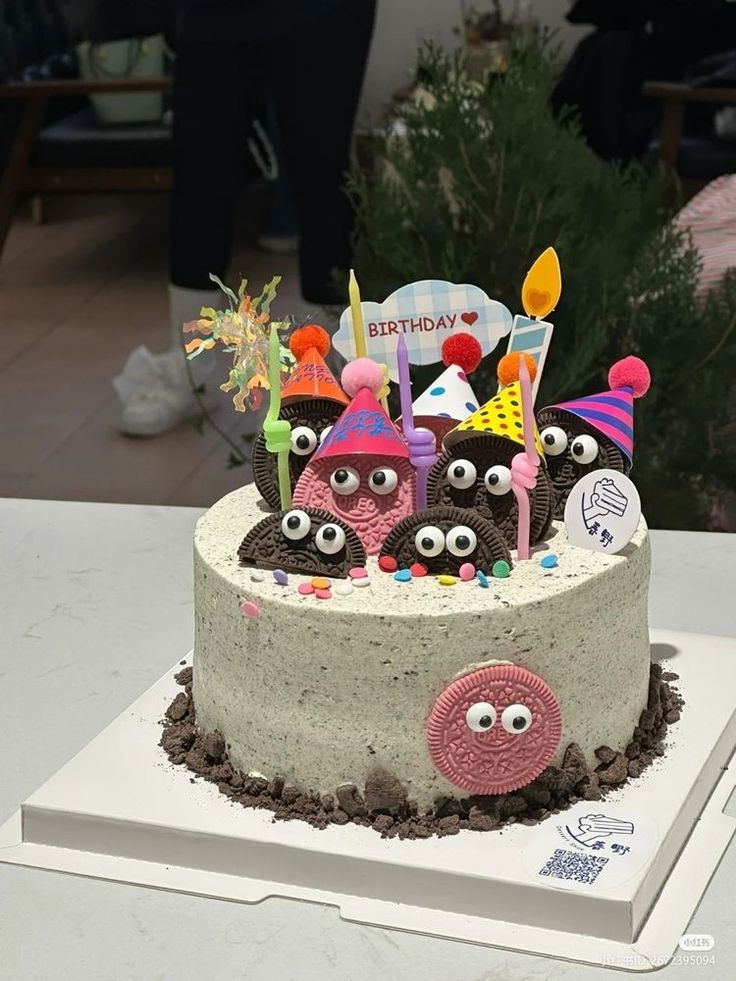 a birthday cake with many decorations on it