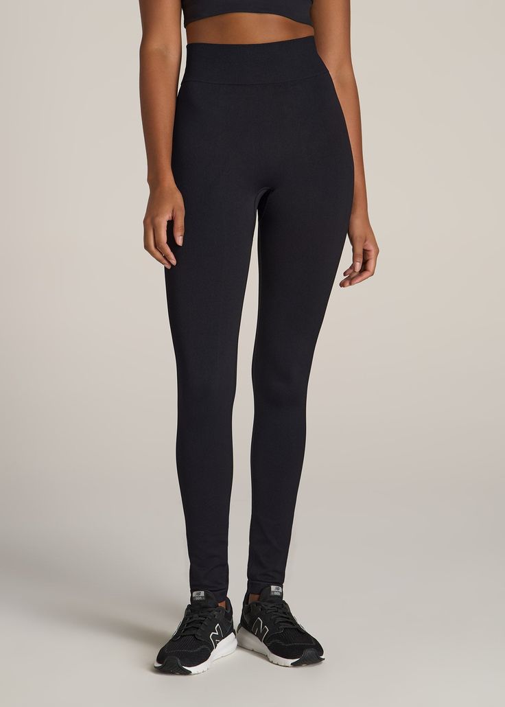 American-Tall-Women-Seamless-Compression-Legging-Solid-Black-front Casual Black Seamless Leggings, Micro-elastic Black Yoga Pants, Seamless Elastane Leggings For Pilates, Sporty Seamless Leggings, Casual Black Seamless Tights, Black Compression Yoga Pants, Seamless Tight Athleisure Leggings, Seamless Tight Leggings For Athleisure, Seamless Elastane Leggings For Workout