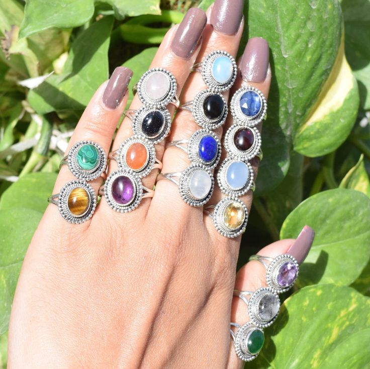 925 Sterling Silver Moonstone / Onyx / Tiger's Eye / Chalcedony / Turquoise / Moonstone / Amethyst Natural Crystal Oval Designer Silver Ring ~ Rainbow Moonstone ~ Lapis Lazuli ~ Labradorite ~ Carnelian ~ Black Onyx ~ Aqua Chalcedony ~ Amethyst ~ Milky Opalite ~ Rose Quartz ~ Emerald ~ Prehnite ~ Garnet ~ Ruby ~ Sapphire ~ Golden Rhutile ~ Green Onyx ~ Larimar weight- 4 Gram The Ring is stamped 925 We guarantee the quality and the genuine properties of silver and the stone.  Delivery-  Delivery ( IMPORTANT PLEASE READ)  Our Aim is to dispatch the parcel in 1 business working day.  FOR UK DELIVERY -  Standard Shipping £3.20- 1st class Non Tracked (1-2 business days)  Tracked 1st Class £4.50   - 1st class Tracked (1-2 business days) (Suggested)  Next Day 1 PM guaranteed £10 - Next business da Natural Silver Moonstone Gemstones, Silver Jewelry With Natural Round Stones, Round Natural Gemstones For Spiritual Use, Round Natural Stone Spiritual Gemstones, Round Spiritual Natural Gemstones, Spiritual Round Cabochon Stone Jewelry, Spiritual Cabochon Round Stone Jewelry, Round Moonstone Jewelry With Stones, Spiritual Cabochon Jewelry With Round Stone