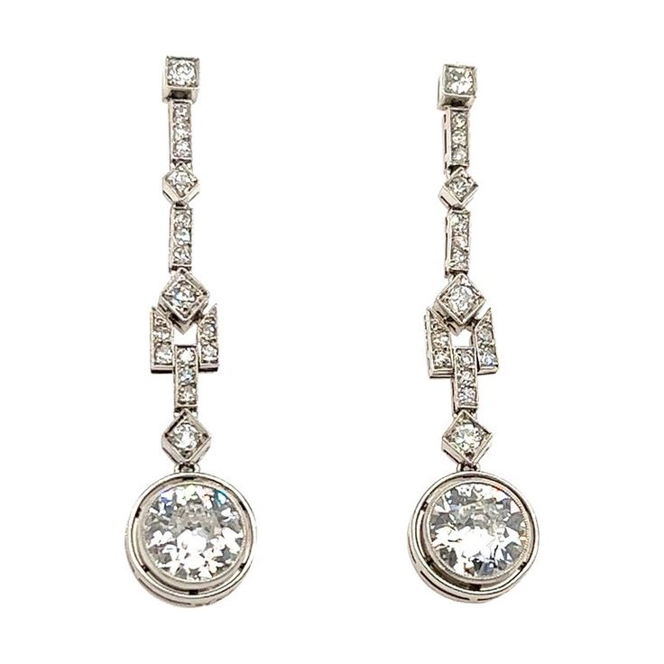 Art Deco French Made Diamond Dangling Platinum Earrings | From a unique collection of vintage Dangle Earrings at https://www.1stdibs.com/jewelry/earrings/dangle-earrings/. Luxury Platinum Diamond Earrings Hallmarked, Art Deco Diamond Earrings For Formal Occasions, White Platinum Hallmarked Earrings, Art Deco Diamond Drop Earrings For Formal Occasions, Formal Hallmarked White Gold Bridal Earrings, Formal White Gold Hallmarked Bridal Earrings, Timeless Platinum Drop Diamond Earrings, Timeless Platinum Diamond Drop Earrings, Silver Art Deco Platinum Diamond Earrings