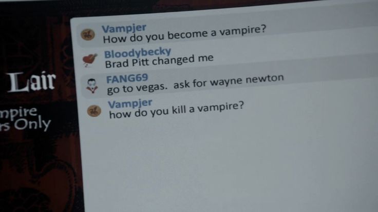 a computer screen with some text on it and an image of vampire's lips