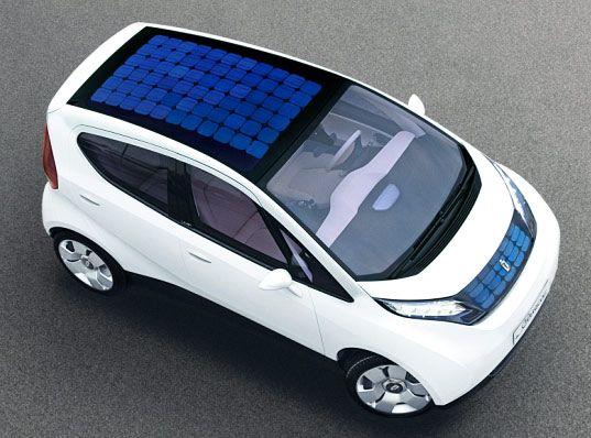 an electric car with solar panels on the roof