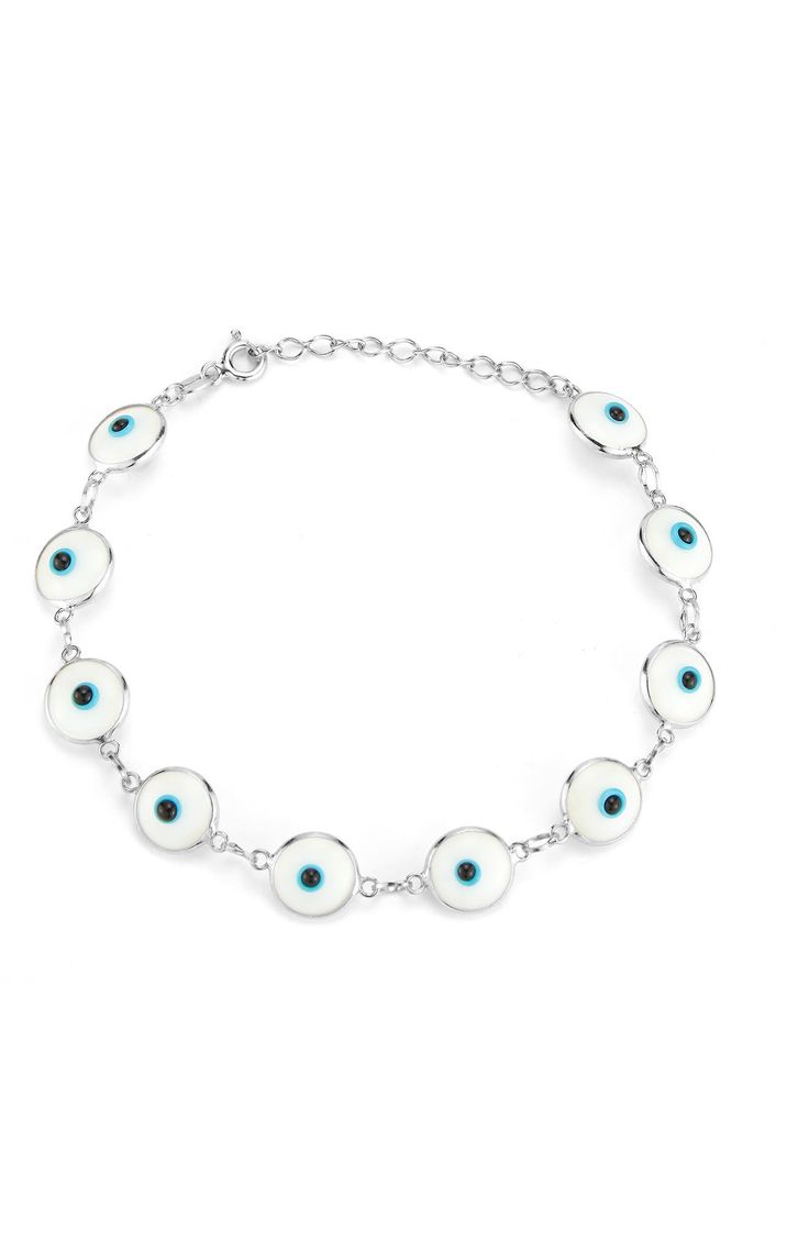 This on-trend evil eye bracelet is crafted from timeless sterling silver that's sure to add the perfect finishing touch to your ensemble. 6" length with 1" extension Spring ring clasp Sterling silver or sterling silver with 14K yellow gold plating/enamel Imported Adjustable White Sterling Silver Bracelet, Silver Enamel Jewelry With Adjustable Chain, Adjustable Round Enamel Bracelets, Enamel Bracelet Jewelry With Lobster Clasp, Enamel Bracelet With Lobster Clasp, White Gold Sterling Silver Evil Eye Jewelry, White Chain Bracelet With Adjustable Chain, White Round Chain Bracelet With Adjustable Chain, White Gold Evil Eye Round Jewelry