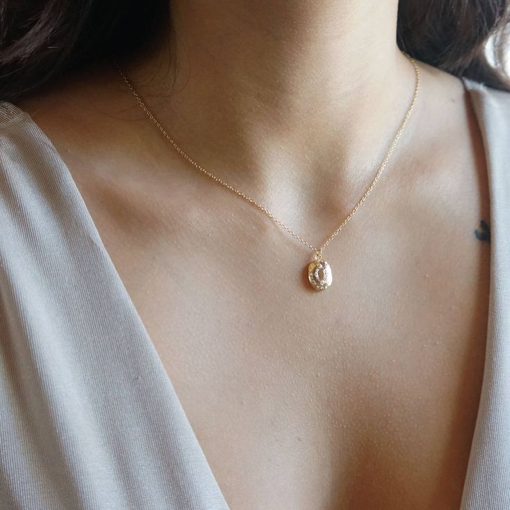 Tiny Locket Necklace, Dainty Vintage Necklace, Gold Oval Jewelry With Delicate Chain, Oval Gold Jewelry With Delicate Chain, Delicate Charm Necklace With Oval Pendant And Adjustable Chain, Delicate Charm Necklace With Oval Pendant, Gold Oval Charm Necklace With Adjustable Chain, Delicate Oval Pendant Necklace For Gifts, Dainty Oval Jewelry With Delicate Chain