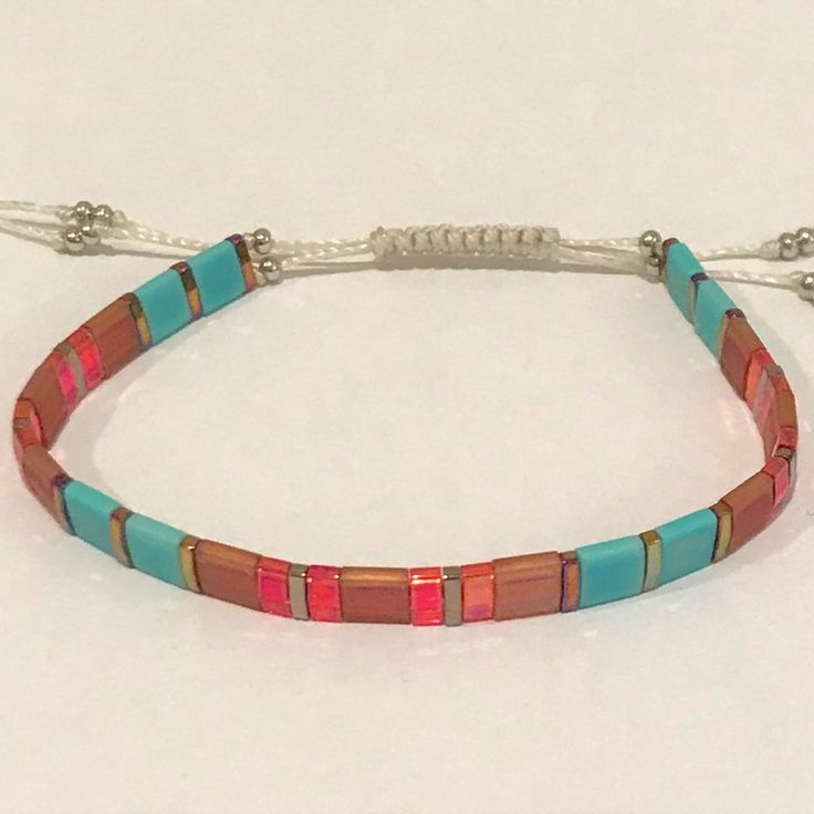 Fun, Stackable, Adjustable Bracelet. Handmade With High-Quality Miyuki Tila Seed Beads. Hand Crafted Jewelry, Bead Jewelry, Crafted Jewelry, Bracelet Handmade, Adjustable Bracelet, Handcrafted Jewelry, Jewelry Crafts, Seed Beads, Red Blue