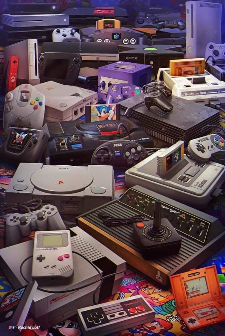 a pile of video game consoles and controllers