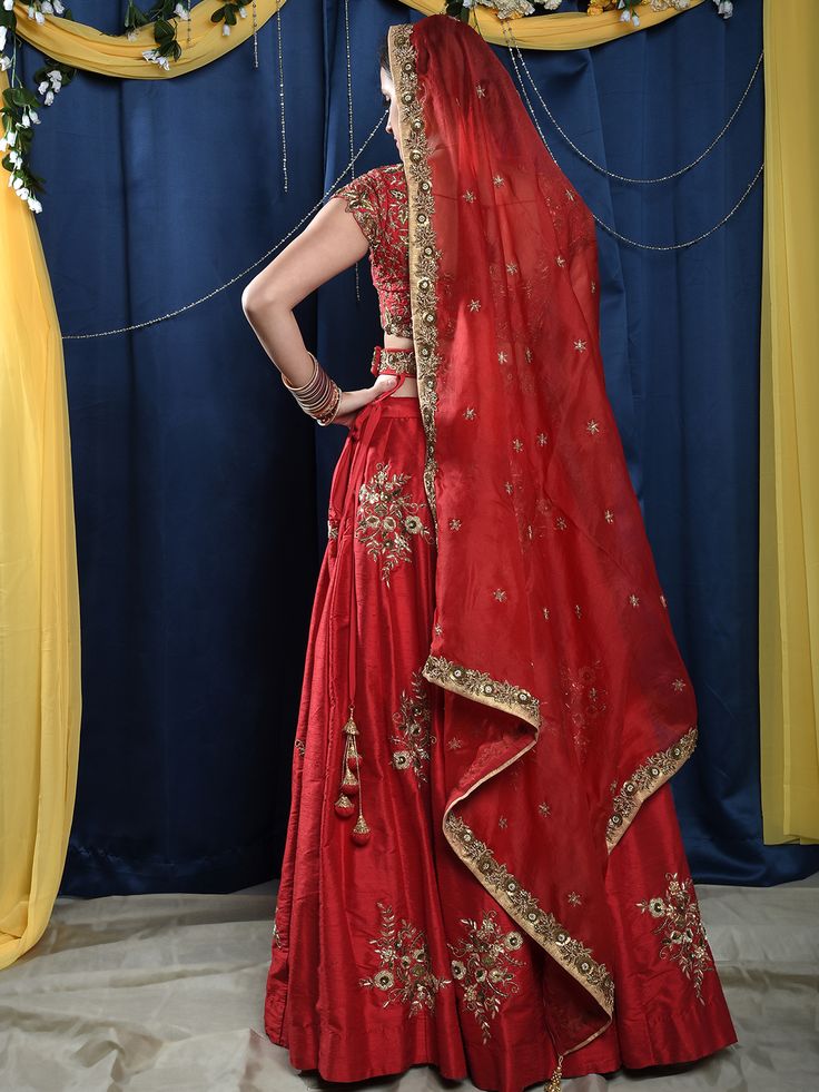 This gorgeous red raw silk bridal lehenga with zardosi and sequins work butti is teamed with a red heavy cutwork blouse. This outfit is completed with a red organza embroidered dupatta.
*Ready to ship in sizes XS, S, M, L Red Kundan Sets With Dupatta, Red Saree Gown With Dupatta, Red Zari Work Chinon Gown, Red Kundan Lehenga For Festivals, Red Anarkali Gown In Organza, Red Kundan Sharara With Resham Embroidery, Red Anarkali Organza Gown, Red Chinon Gown With Zari Work, Red Organza Anarkali Gown