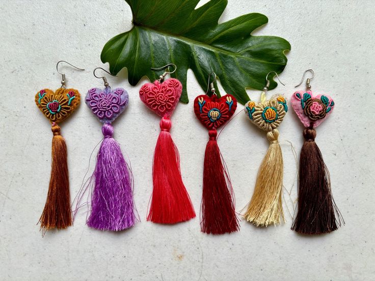 All of our earrings are made with sterling silver hooks, they are made of 925 sterling silver and the clasps of the earrings are made of transparent silicone. Especially for people with mild sensitivity. Beaded earrings, mexican earrings, huichol art, gift for her. We ship anywhere in the word, from Tepic, Nayarit,  mx. Handmade Artisan Heart Earrings, Unique Handmade Heart Earrings, Small Handmade Earrings For Gift, Embroidered Drop Earrings As Gift, Embroidered Drop Earrings For Gift, Bohemian Handmade Earrings, Gift For Her, Handmade Bohemian Earrings As Gift For Her, Handmade Heart-shaped Earrings For Her, Handmade Small Adjustable Earrings