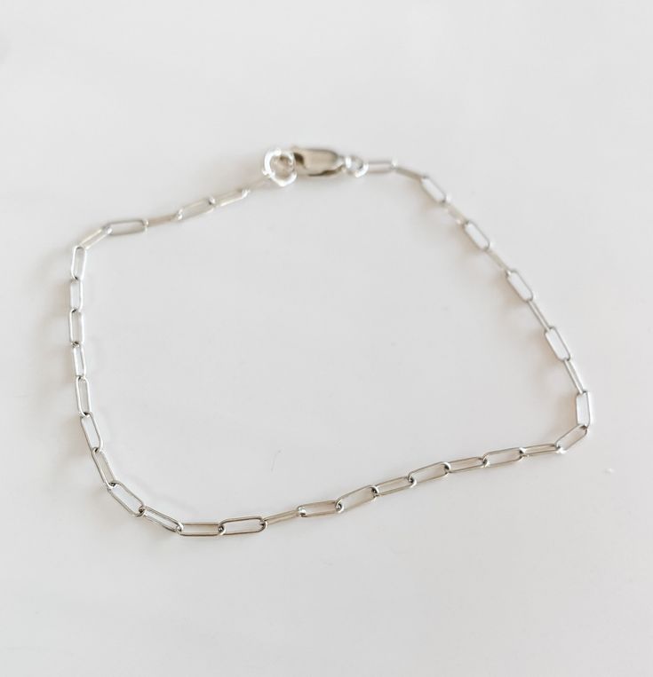 The most beautiful dainty Jenni mini silver paperclip chain! sterling silver Trendy Sterling Silver Oval Link Jewelry, Elegant Silver Chain Paperclip Bracelet As Gift, Classic Silver Chain Bracelet For Everyday, Elegant Silver Chain Link Paperclip Bracelet, Silver Oval Link Chain Bracelet Minimalist Style, Minimalist Silver Chain Bracelet With Sterling Clasp, Silver Bracelets With Rectangular Links For Everyday, Minimalist Silver Bracelet With Lobster Clasp, Silver Minimalist Bracelet With Lobster Clasp