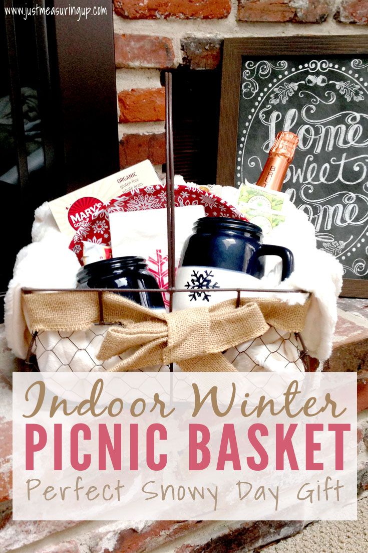 a picnic basket is shown with the words indoor winter picnic basket perfect snowy day gift