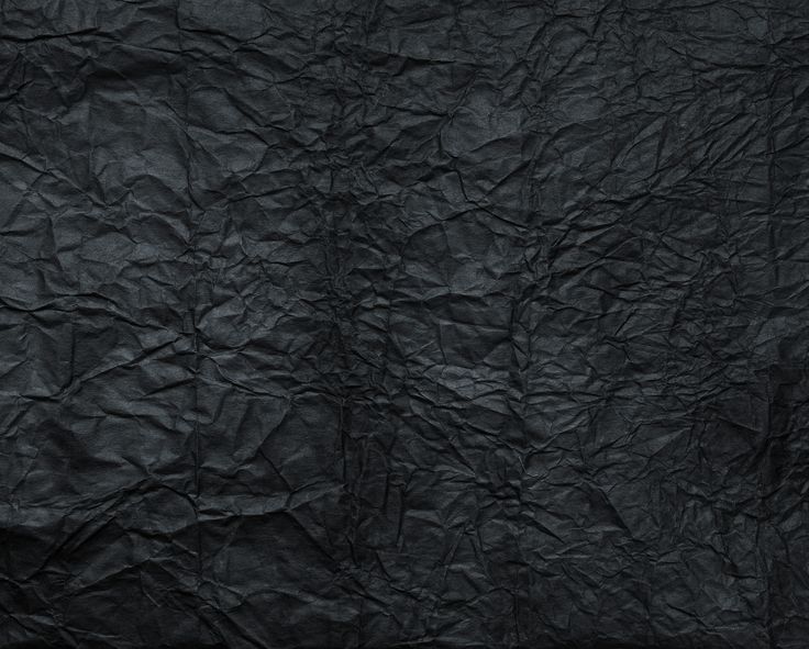 an image of a black paper textured with gold