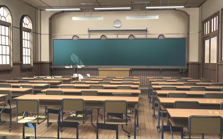 an empty classroom with desks and chairs