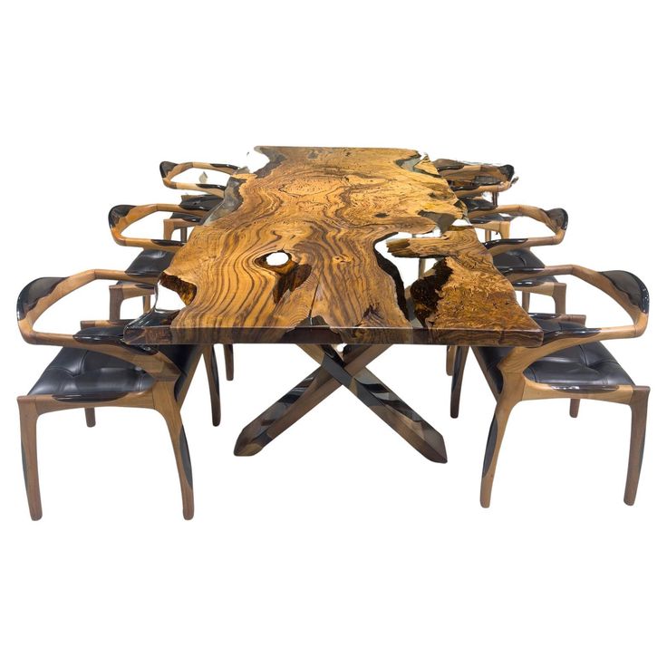 a wooden table with black leather chairs and an animal head on it's back