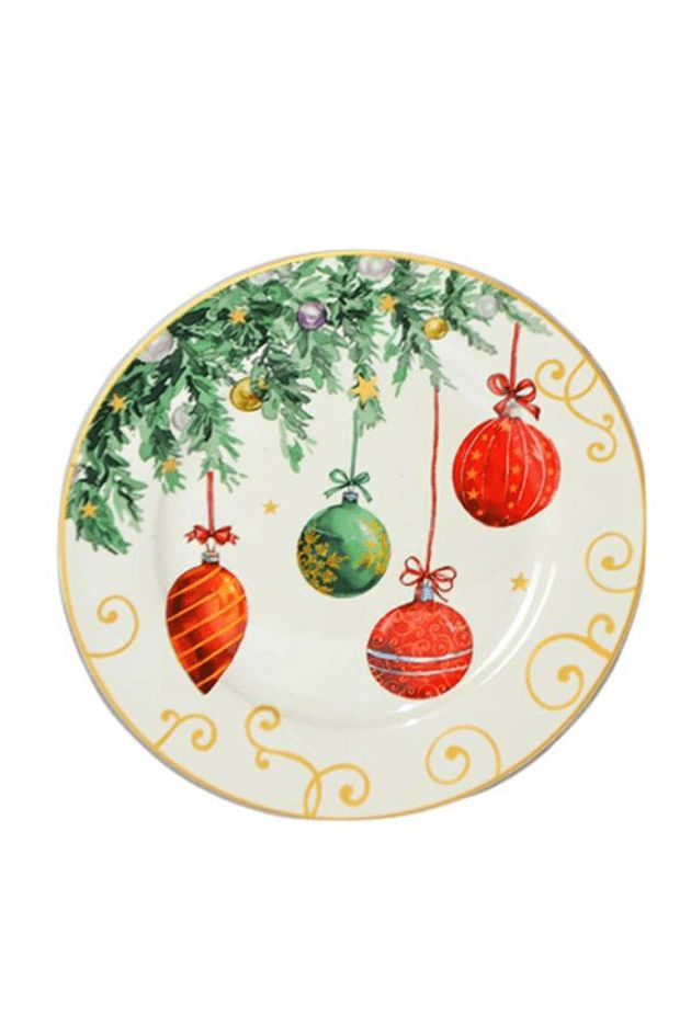 a plate with ornaments hanging from it's side on a white background and gold trim