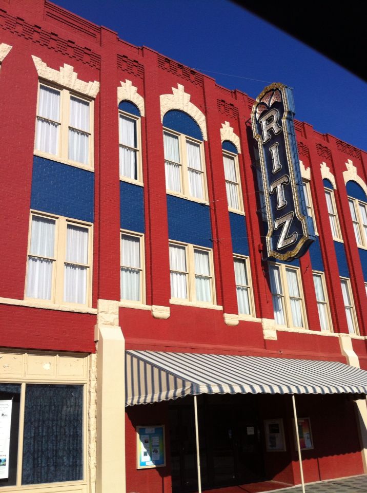 an old building with a sign on the front