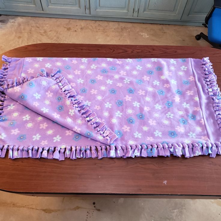 Adorable Handmade Tie Knot Purple With Blue And Pink Flowers Fleece Blanket, Perfect For A Little Girl, Nwot Dimensions: Length: 52.5" Width: 50" Smoke Free Home Tie Blankets Fleece, Tie Knot Blanket, Knot Blanket, Fleece Blankets, Foster Care, Tie Knots, Blue And Pink, Fleece Blanket, Blue Purple