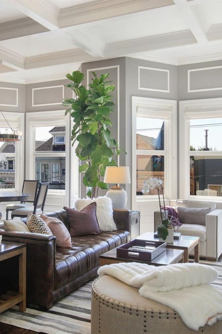 Classic Small Living Room With Brown Leather Sofa And Modern Touch