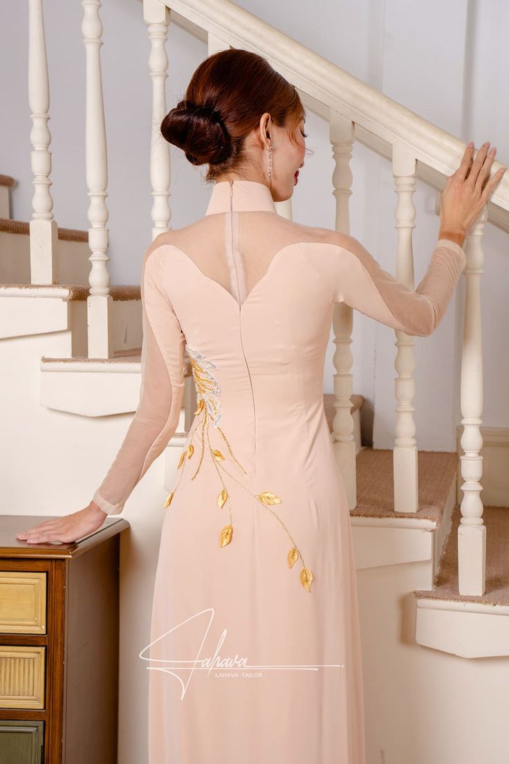 Elegant Embroidered Cheongsam For Spring, Elegant Spring Gown With Intricate Embroidery, Intricate Embroidery Ao Dai For Wedding, Elegant Floor-length Dresses With Embroidered Sleeves, Elegant Party Gown With Embroidered Sleeves, Elegant Spring Ceremony Gown, Ceremonial Fitted Ao Dai With Intricate Embroidery, Fitted Ao Dai With Intricate Embroidery For Ceremony, Ceremony Ao Dai With Intricate Embroidery