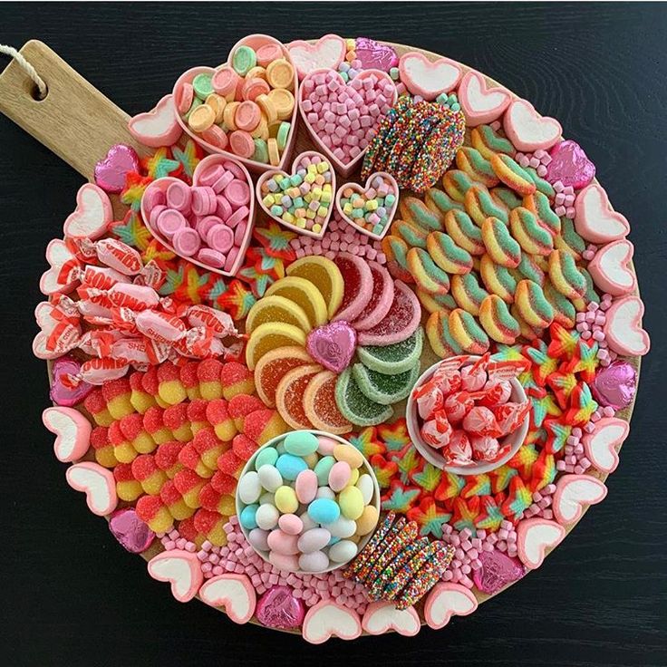 a platter filled with lots of different types of candy