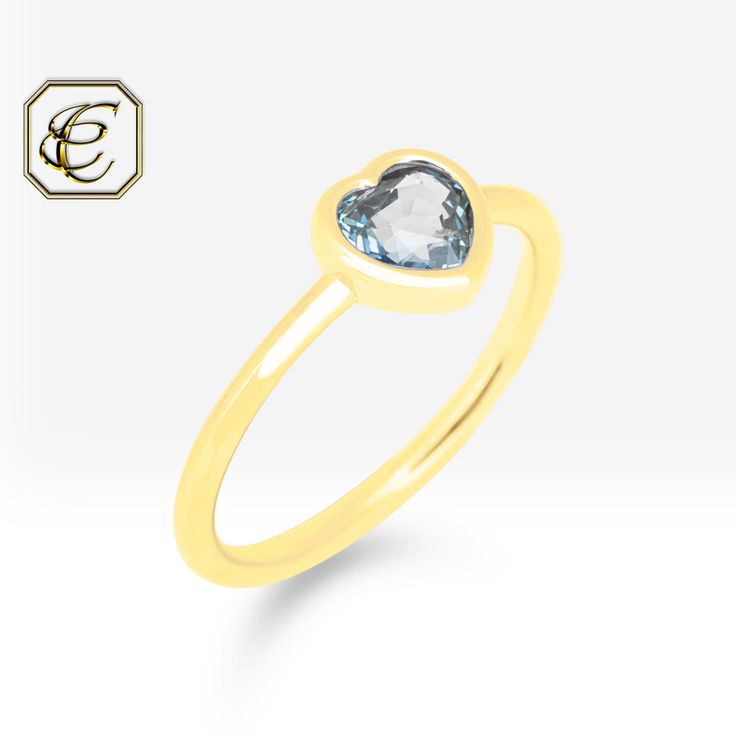 "Blue Sapphire Ring / 14k Gold Ring Gift for Her / Handmade Sapphire Engagement Ring / Fine Jewelry by Chelebi Heart Blue Sapphire Ring is with natural sapphire and it is 14K solid gold. The Sapphire in the ring is a real natural sapphire.  This Minimalist Blue Sapphire ring is a great choice for everyday use or for gifting her.                          DETAILS  ✶ Gold Kt: 14K Solid Gold ✶ Gold Color: Rose, Yellow, White Gold  ✶ Gemstone: Natural Sapphire ✶ Gemstone Color: Blue ✶ Gemstone Shape: Heart ✶ GemstoneTotal Carat: 0.95 ct ✶ Gemstone Quantity: 1 pcs ✶ Gemstone Size: 5.7 x 5.7 mm  ✶ Diamond Type: Natural ✶ Diamond Total Carat: 0.05 ct ✶ Diamond Color and Clarity: G - Vs2 ✶ Diamond Shape: Round Cut ✶ Diamond Quantity: 20 pcs ✶ Diamond Size Approx: 0.80 mm ✶ Setting Type: Micro Bezel Sterling Silver Yellow Gold Topaz Ring Gift, 14k Gold Topaz Ring Gift, 14k Gold Yellow Gold Solitaire Heart Ring, Yellow Gold Topaz Ring In Sterling Silver Gift, 14k Yellow Gold Heart Ring With Gemstone, Gold Heart Rings With Bezel Setting, 14k Gold Heart Ring With Birthstone, Valentine's Day Yellow Gold Stackable Rings, Gold-toned Sterling Silver Topaz Promise Ring